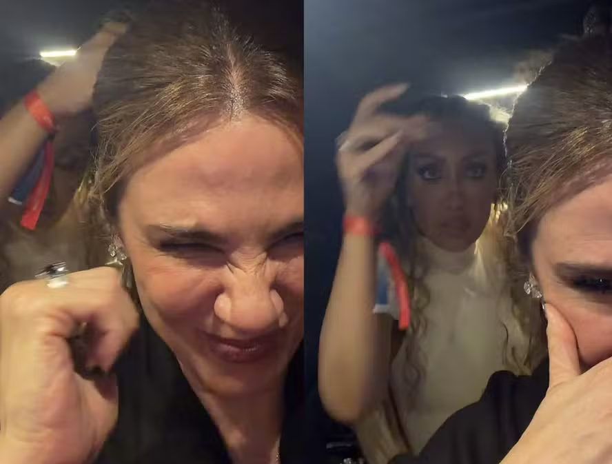 Luciana Gimenez precisou da ajuda de uma amiga para retirar apliques e desfazer o penteado elaborado usado durante evento